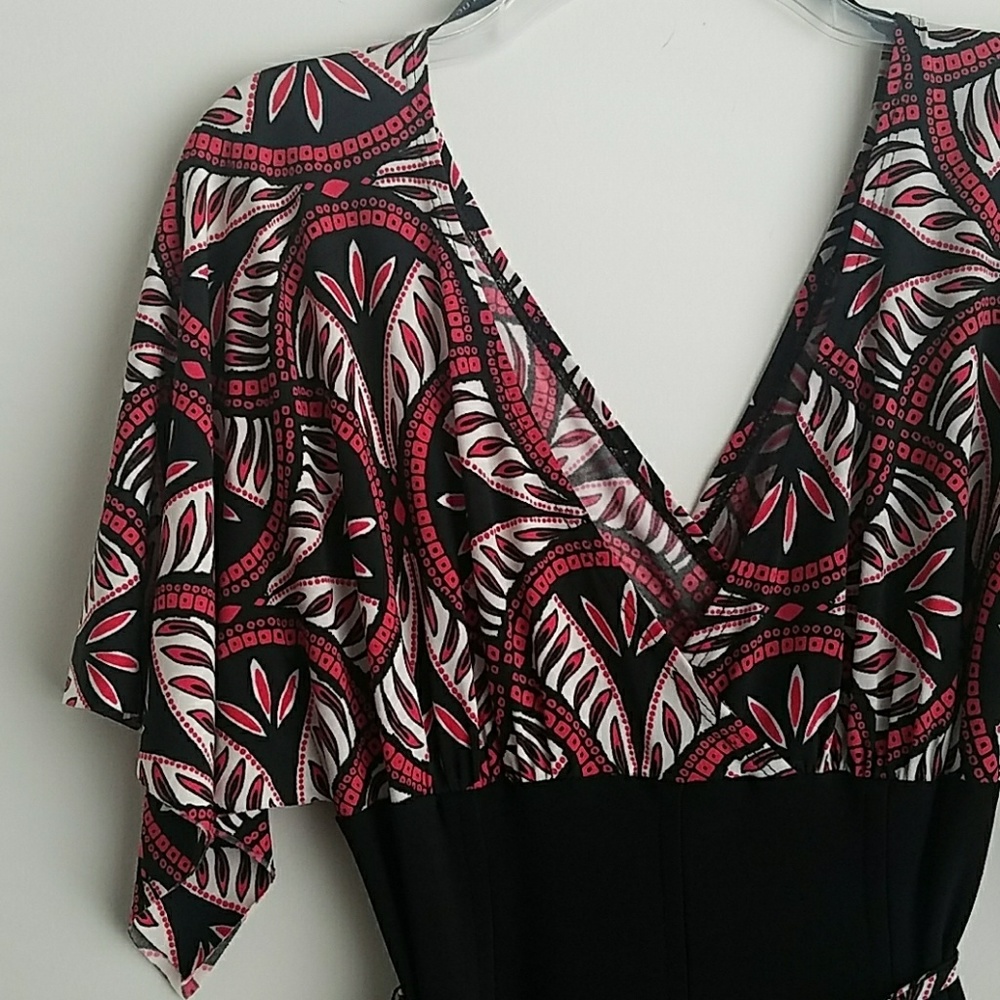 Red, black, and white faux wrap dress